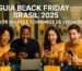 Três pessoas sorrindo usando notebook e celular durante pesquisa de ofertas online na Black Friday 2025 no Brasil — imagem ilustrativa do guia Ferax.